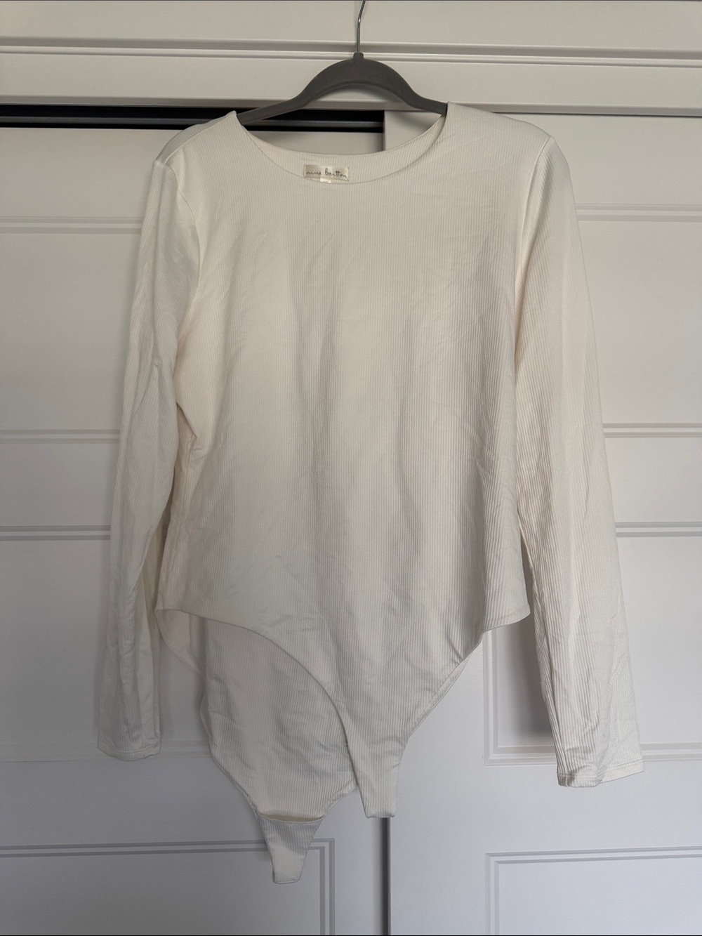nine britton White Ribbed Long-Sleeve Bodysuit